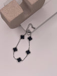 Four-leaf clover bracelet with black clover & silver chain - lobster clasp fastener