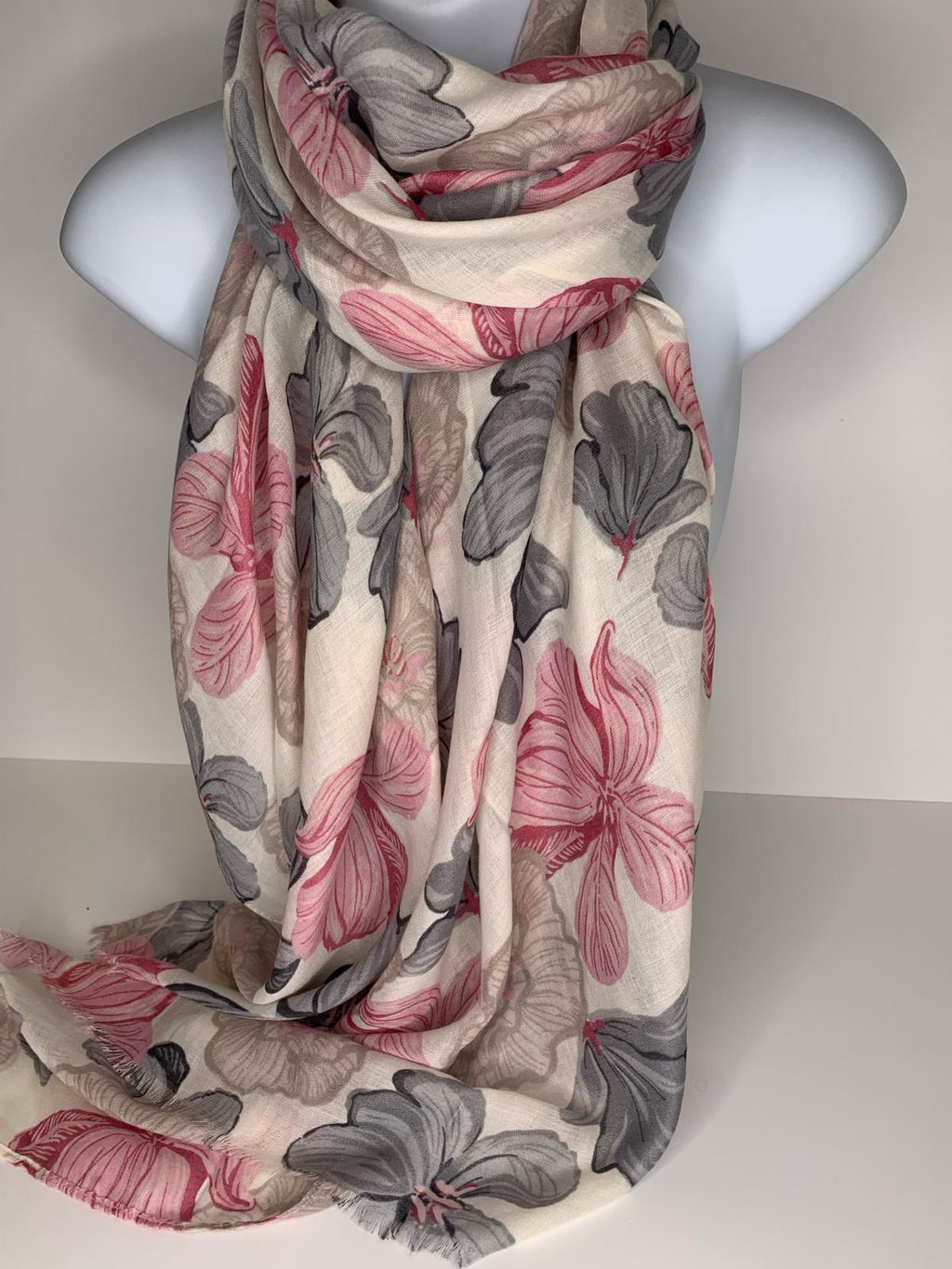 Neutral background, botanical print scarf in pink and grey
