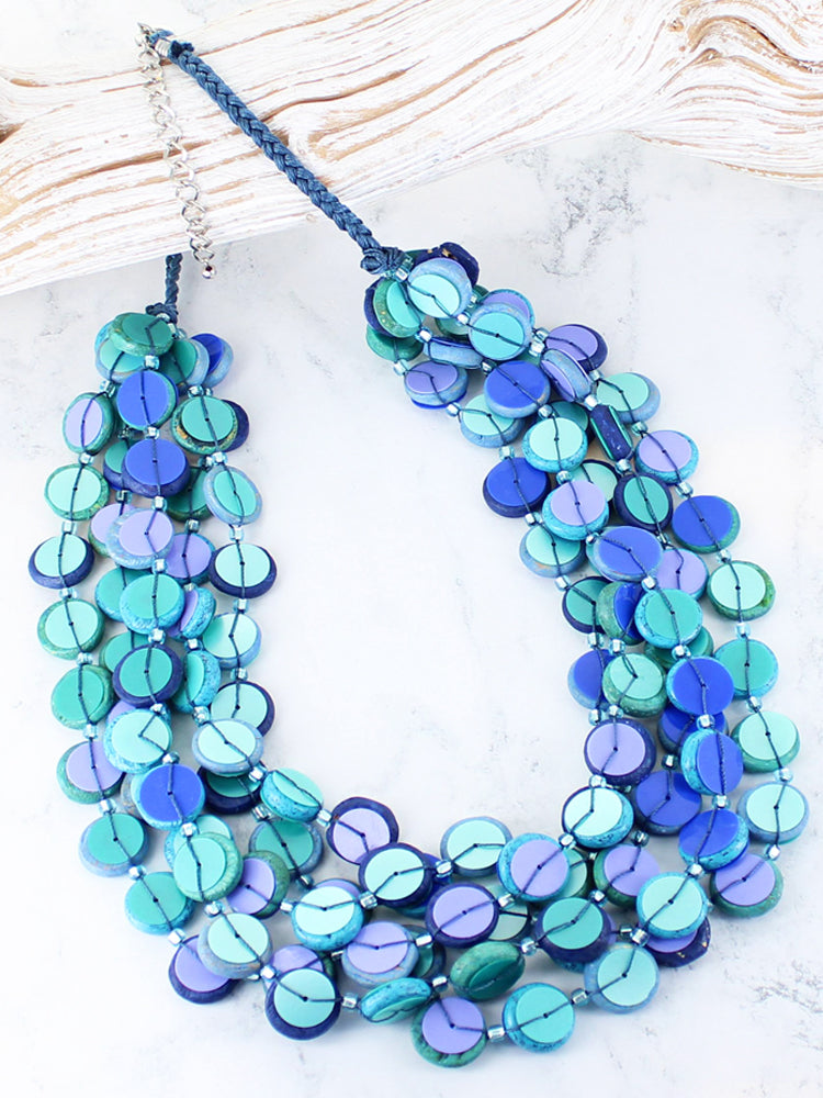 Short necklace, with wooden & sequin royal blue and aqua stations - on a blue-twist chain