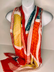 Abstract design print scarf in shades of lemon, orange, red and petrol blue