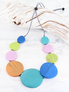 Adjustable organic wooden necklace with blue, lime green, pink, orange and aqua circular stations