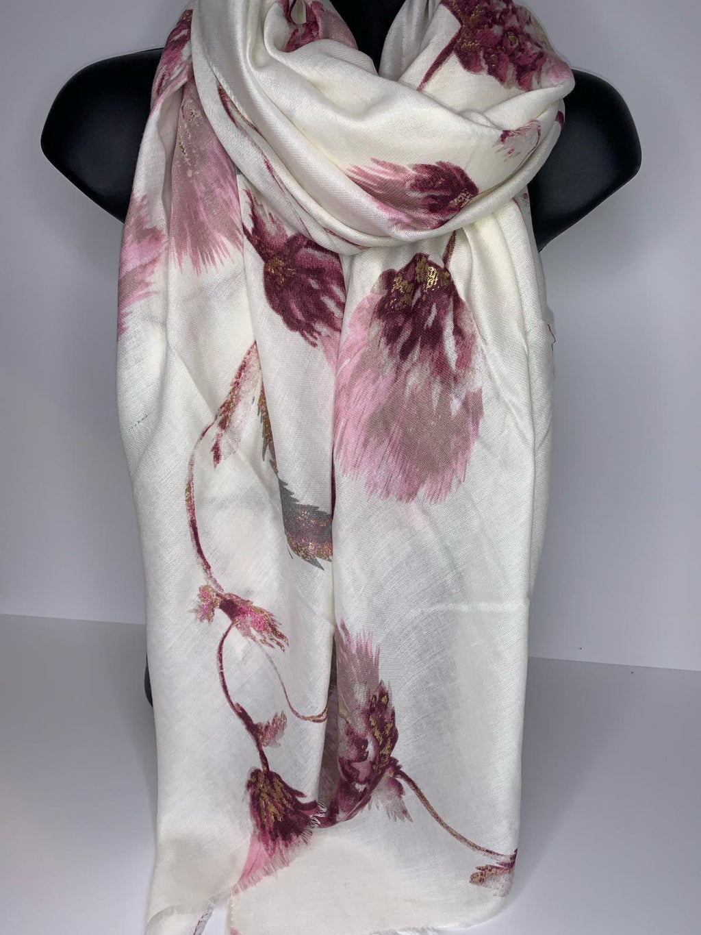 Floral printed scarf with a neutral background, with muted colours