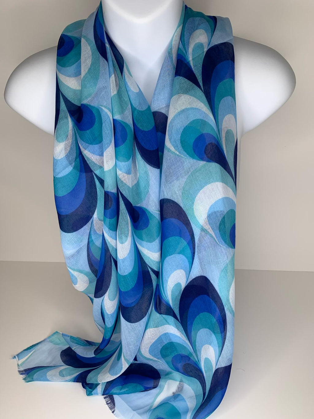 Blue shades in geometric style print scarf