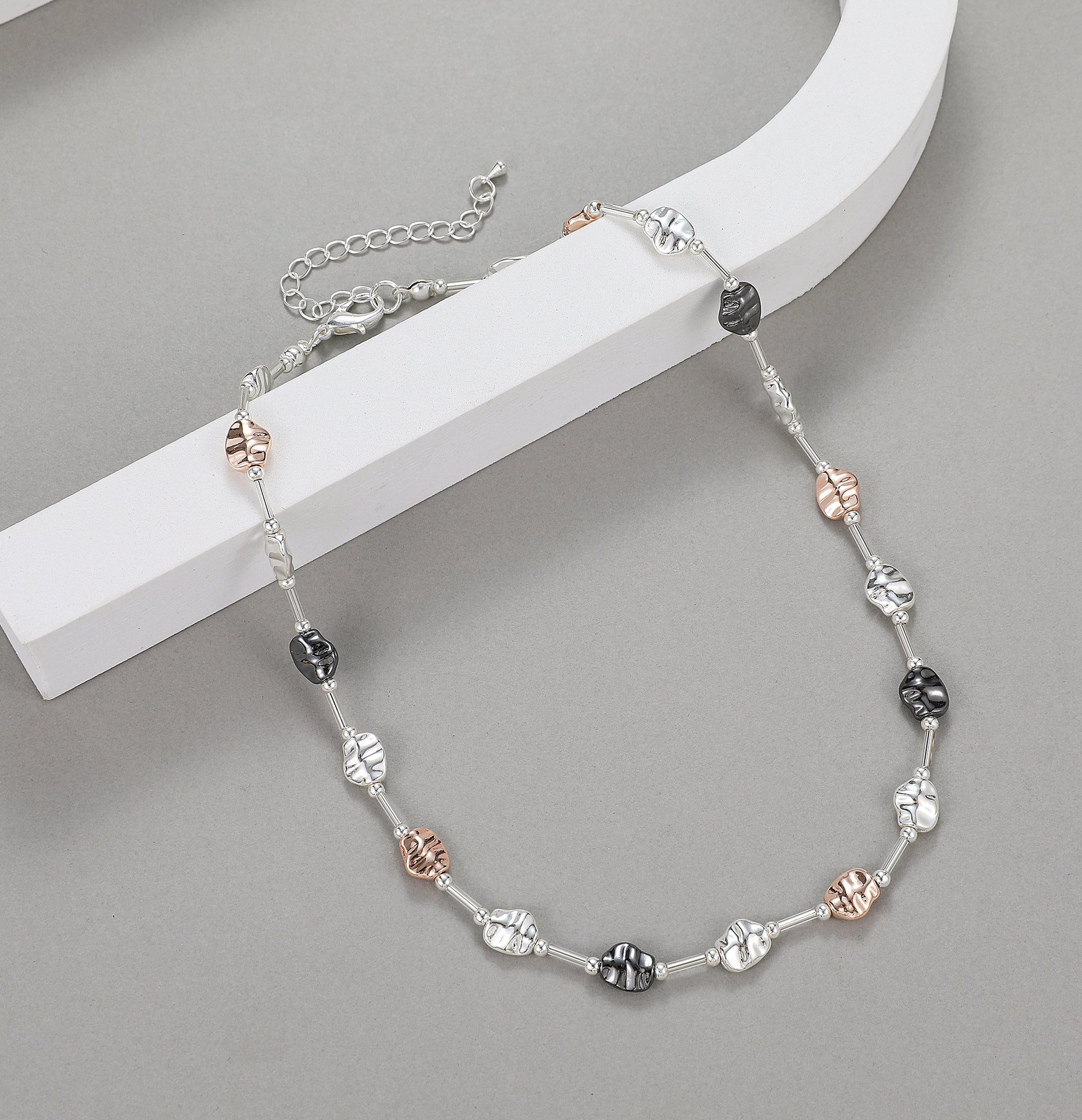 Short necklace, with rose gold, silver and pewter nuggets - on a silver chain