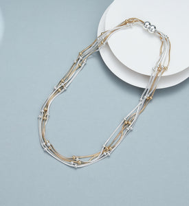 Short necklace, with silver and gold strands, beads and magnetic opening/closure  - on gold and silver strands