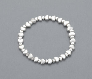 Elasticated bracelet with silver heart detail