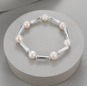 Mother of pearl elasticated bracelet with silver stations