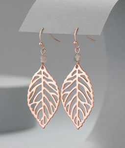 Open leaf design earrings in rose gold tone